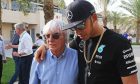 Bernie Ecclestone (GBR) with Lewis Hamilton (GBR) Mercedes