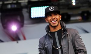 Hamilton feeds off British fans in emotional home win