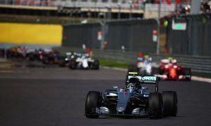 Rosberg eases to win as Kvyat takes out Vettel