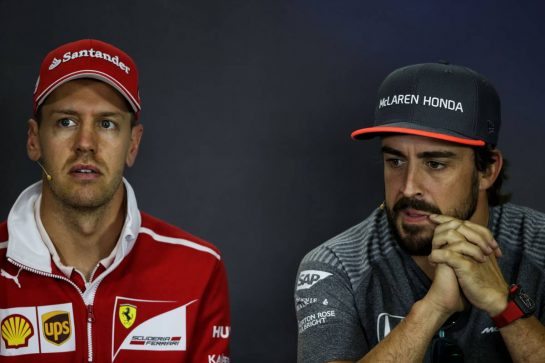 (L to R): Sebastian Vettel (GER) Ferrari with Fernando Alonso (ESP) McLaren in the FIA Press Conference.
27.07.2017. Formula 1 World Championship, Rd 11, Hungarian Grand Prix, Budapest, Hungary, Preparation Day.
- www.xpbimages.com, EMail: requests@xpbimages.com - copy of publication required for printed pictures. Every used picture is fee-liable. © Copyright: Moy / XPB Images