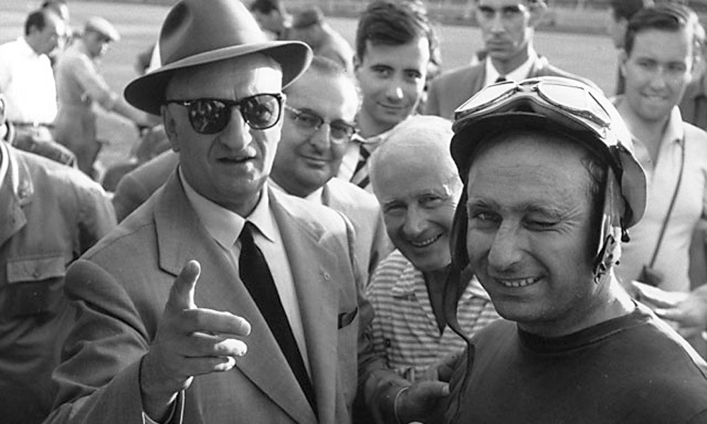 Enzo Ferrari and Juan Manuel Fangio, at the 1956 Italian Grand Prix