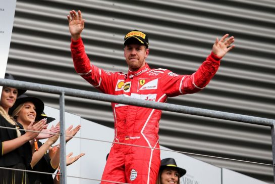 Sebastian Vettel (GER) Ferrari celebrates his second position on the podium.
27.08.2017. Formula 1 World Championship, Rd 12, Belgian Grand Prix, Spa Francorchamps, Belgium, Race Day.
- www.xpbimages.com, EMail: requests@xpbimages.com - copy of publication required for printed pictures. Every used picture is fee-liable. © Copyright: Moy / XPB Images