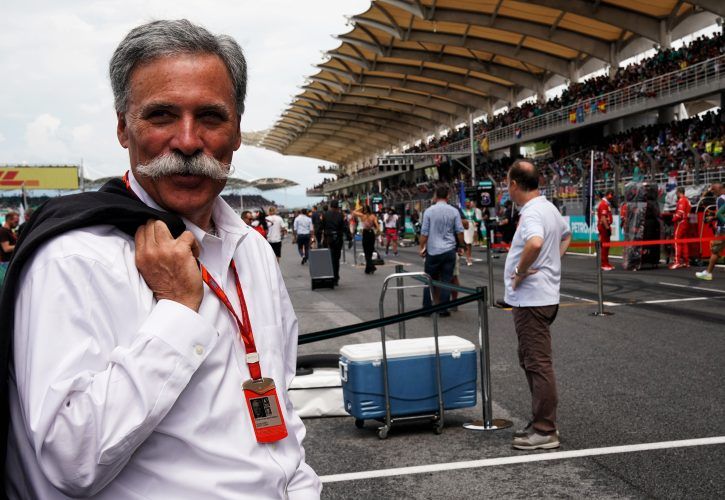 Chase Carey (USA) Formula One Group Chairman on the grid.