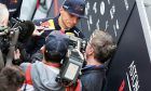 Max Verstappen (NLD) Red Bull Racing with the media.