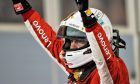 Bahrain Grand Prix: Race winner Sebastian Vettel (GER) Ferrari celebrates in parc ferme