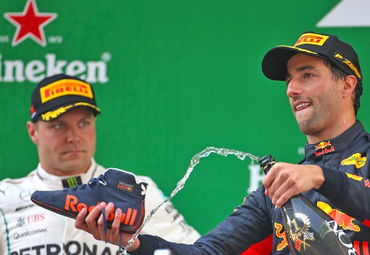 Daniel Ricciardo (AUS) Red Bull Racing and Valtteri Bottas (FIN) Mercedes on the Chinese Grand Prix podium