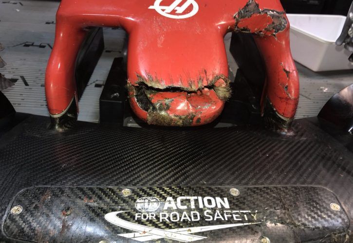 The front wing of Romain Grosjean's Haas is badly damaged after hitting a groundhog at the Circuit Gilles Villeneuve.