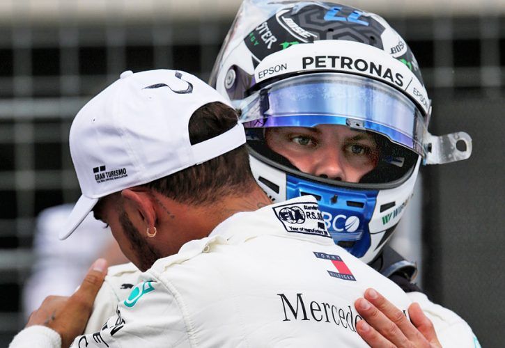 Lewis Hamilton (GBR) Mercedes AMG F1 celebrates his pole position in qualifying parc ferme with second placed team mate Valtteri Bottas