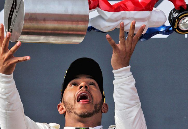 French Grand Prix race winner Lewis Hamilton (GBR) Mercedes AMG F1 celebrates on the podium.
