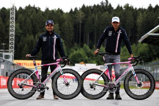 (L to R): Sergio Perez (MEX) Sahara Force India F1 with Esteban Ocon (FRA) Sahara Force India F1 Team - Wyndy Milla bicycles.
28.06.2018. Formula 1 World Championship, Rd 9, Austrian Grand Prix, Spielberg, Austria, Preparation Day.
- www.xpbimages.com, EMail: requests@xpbimages.com - copy of publication required for printed pictures. Every used picture is fee-liable. © Copyright: Batchelor / XPB Images