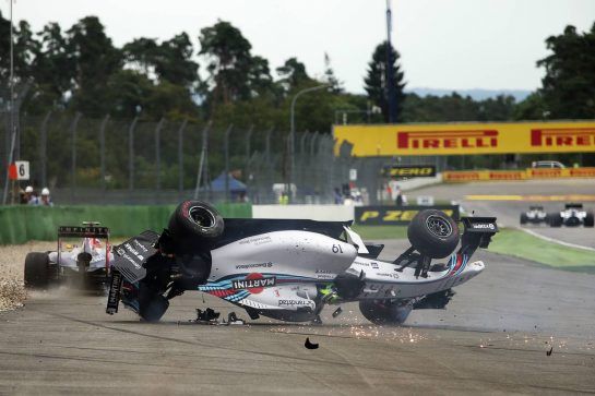 Felipe Massa (BRA) Williams FW36 crashes at the start of the race, avoided by Daniel Ricciardo (AUS) Red Bull Racing RB10.
20.07.2014. Formula 1 World Championship, Rd 10, German Grand Prix, Hockenheim, Germany, Race Day.
- www.xpbimages.com, EMail: requests@xpbimages.com - copy of publication required for printed pictures. Every used picture is fee-liable. © Copyright: Charniaux / XPB Images