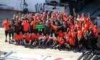 Romain Grosjean (FRA) Haas F1 Team VF-18 and Kevin Magnussen (DEN) Haas VF-18 celebrate with the team