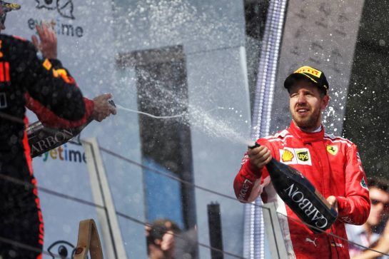 Sebastian Vettel (GER) Ferrari celebrates his third position on the podium.
01.07.2018. Formula 1 World Championship, Rd 9, Austrian Grand Prix, Spielberg, Austria, Race Day.
- www.xpbimages.com, EMail: requests@xpbimages.com - copy of publication required for printed pictures. Every used picture is fee-liable. © Copyright: Bearne / XPB Images
