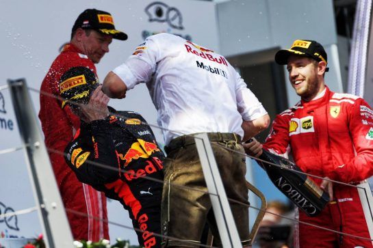 (L to R): Race winner Max Verstappen (NLD) Red Bull Racing celebrates on the podium with Jonathan Wheatley (GBR) Red Bull Racing Team Manager and Sebastian Vettel (GER) Ferrari.
01.07.2018. Formula 1 World Championship, Rd 9, Austrian Grand Prix, Spielberg, Austria, Race Day.
- www.xpbimages.com, EMail: requests@xpbimages.com - copy of publication required for printed pictures. Every used picture is fee-liable. © Copyright: Bearne / XPB Images
