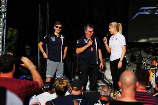 (L to R): George Russell (GBR) Sahara Force India F1 Test Driver with Otmar Szafnauer (USA) Sahara Force India F1 Chief Operating Officer and Rosanna Tennant (GBR) F1 Presenter on stage at the Sahara Force India F1 Team Fan Zone.
06.07.2018. Formula 1 World Championship, Rd 10, British Grand Prix, Silverstone, England, Practice Day.
- www.xpbimages.com, EMail: requests@xpbimages.com - copy of publication required for printed pictures. Every used picture is fee-liable. © Copyright: Moy / XPB Images