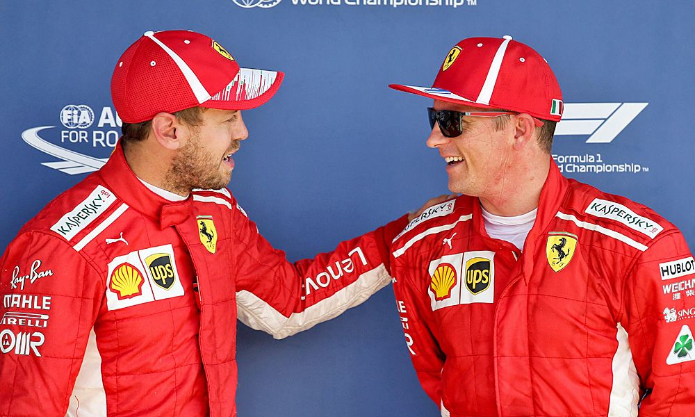 Sebastian Vettel (GER) Ferrari with team mate Kimi Raikkonen