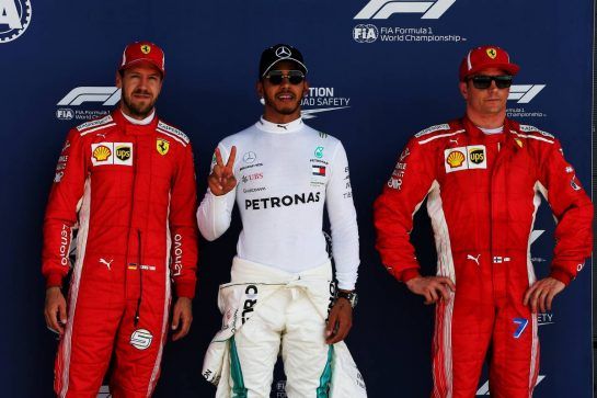 Qualifying top three in parc ferme (L to R): Sebastian Vettel (GER) Ferrari, second; Lewis Hamilton (GBR) Mercedes AMG F1, pole position; Kimi Raikkonen (FIN) Ferrari, third.
07.07.2018. Formula 1 World Championship, Rd 10, British Grand Prix, Silverstone, England, Qualifying Day.
- www.xpbimages.com, EMail: requests@xpbimages.com - copy of publication required for printed pictures. Every used picture is fee-liable. © Copyright: Photo4 / XPB Images