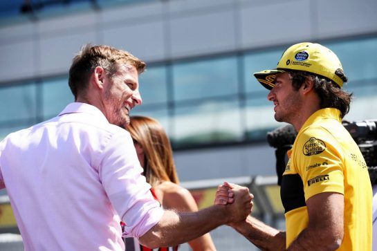 (L to R): Jenson Button (GBR) with Carlos Sainz Jr (ESP) Renault Sport F1 Team on the drivers parade.
08.07.2018. Formula 1 World Championship, Rd 10, British Grand Prix, Silverstone, England, Race Day.
- www.xpbimages.com, EMail: requests@xpbimages.com - copy of publication required for printed pictures. Every used picture is fee-liable. © Copyright: Batchelor / XPB Images
