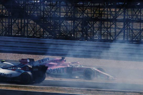 Sergio Perez (MEX) Sahara Force India F1 VJM11 spins off at the start of the race, narrowly missed by Sergey Sirotkin (RUS) Williams FW41 leaving the pit lane.
08.07.2018. Formula 1 World Championship, Rd 10, British Grand Prix, Silverstone, England, Race Day.
- www.xpbimages.com, EMail: requests@xpbimages.com - copy of publication required for printed pictures. Every used picture is fee-liable. © Copyright: Charniaux / XPB Images