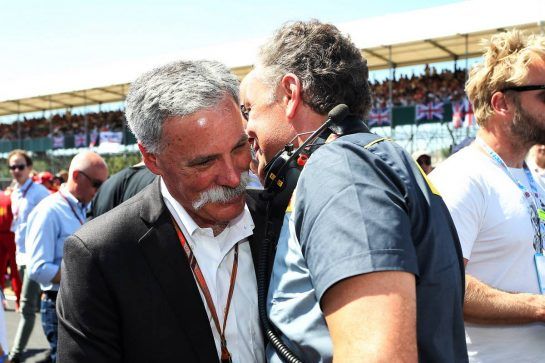 (L to R): Chase Carey (USA) Formula One Group Chairman with Mario Isola (ITA) Pirelli Racing Manager on the grid.
08.07.2018. Formula 1 World Championship, Rd 10, British Grand Prix, Silverstone, England, Race Day.
- www.xpbimages.com, EMail: requests@xpbimages.com - copy of publication required for printed pictures. Every used picture is fee-liable. © Copyright: Photo4 / XPB Images