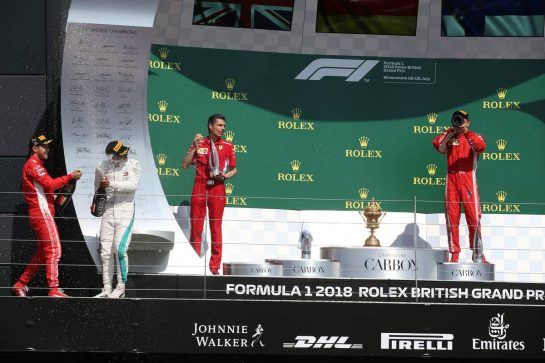 1st place Sebastian Vettel (GER) Ferrari SF71H, 2nd place Lewis Hamilton (GBR) Mercedes AMG F1 W09 and 3rd place Kimi Raikkonen (FIN) Ferrari SF71H. 
08.07.2018. Formula 1 World Championship, Rd 10, British Grand Prix, Silverstone, England, Race Day.
- www.xpbimages.com, EMail: requests@xpbimages.com - copy of publication required for printed pictures. Every used picture is fee-liable. © Copyright: Batchelor / XPB Images