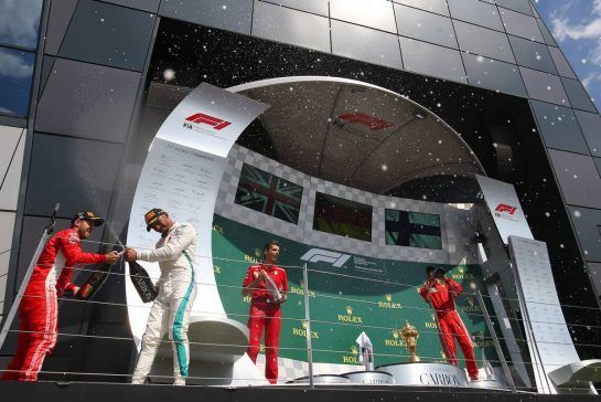 Lewis Hamilton (GBR) Mercedes AMG F1 , Sebastian Vettel (GER) Scuderia Ferrari and Kimi Raikkonen (FIN) Scuderia Ferrari 
08.07.2018. Formula 1 World Championship, Rd 10, British Grand Prix, Silverstone, England, Race Day.
- www.xpbimages.com, EMail: requests@xpbimages.com - copy of publication required for printed pictures. Every used picture is fee-liable. © Copyright: Charniaux / XPB Images