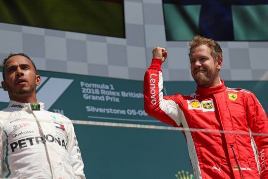 Sebastian Vettel (GER) Scuderia Ferrari and Lewis Hamilton (GBR) Mercedes AMG F1  
08.07.2018. Formula 1 World Championship, Rd 10, British Grand Prix, Silverstone, England, Race Day.
- www.xpbimages.com, EMail: requests@xpbimages.com - copy of publication required for printed pictures. Every used picture is fee-liable. © Copyright: Charniaux / XPB Images
