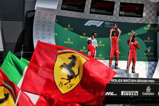The podium (L to R): Lewis Hamilton (GBR) Mercedes AMG F1, second; Sebastian Vettel (GER) Ferrari, race winner; Kimi Raikkonen (FIN) Ferrari, third.
08.07.2018. Formula 1 World Championship, Rd 10, British Grand Prix, Silverstone, England, Race Day.
- www.xpbimages.com, EMail: requests@xpbimages.com - copy of publication required for printed pictures. Every used picture is fee-liable. © Copyright: Moy / XPB Images