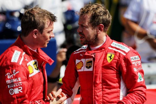(L to R): Kimi Raikkonen (FIN) Ferrari with team mate and race winner Sebastian Vettel (GER) Ferrari in parc ferme.
08.07.2018. Formula 1 World Championship, Rd 10, British Grand Prix, Silverstone, England, Race Day.
- www.xpbimages.com, EMail: requests@xpbimages.com - copy of publication required for printed pictures. Every used picture is fee-liable. © Copyright: Moy / XPB Images