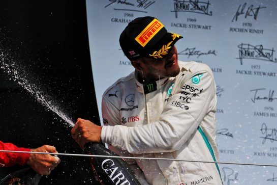 Lewis Hamilton (GBR) Mercedes AMG F1 celebrates his second position on the podium.
08.07.2018. Formula 1 World Championship, Rd 10, British Grand Prix, Silverstone, England, Race Day.
- www.xpbimages.com, EMail: requests@xpbimages.com - copy of publication required for printed pictures. Every used picture is fee-liable. © Copyright: Moy / XPB Images