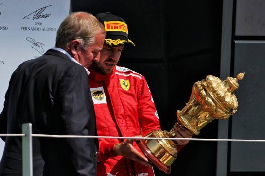 Race winner Sebastian Vettel (GER) Ferrari on the podium with Martin Brundle (GBR) Sky Sports Commentator.
08.07.2018. Formula 1 World Championship, Rd 10, British Grand Prix, Silverstone, England, Race Day.
- www.xpbimages.com, EMail: requests@xpbimages.com - copy of publication required for printed pictures. Every used picture is fee-liable. © Copyright: Moy / XPB Images