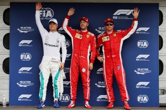 Qualifying top three in parc ferme (L to R): Valtteri Bottas (FIN) Mercedes AMG F1, second; Sebastian Vettel (GER) Ferrari, pole position; Kimi Raikkonen (FIN) Ferrari, third.
21.07.2018. Formula 1 World Championship, Rd 11, German Grand Prix, Hockenheim, Germany, Qualifying Day.
- www.xpbimages.com, EMail: requests@xpbimages.com - copy of publication required for printed pictures. Every used picture is fee-liable. © Copyright: Moy / XPB Images