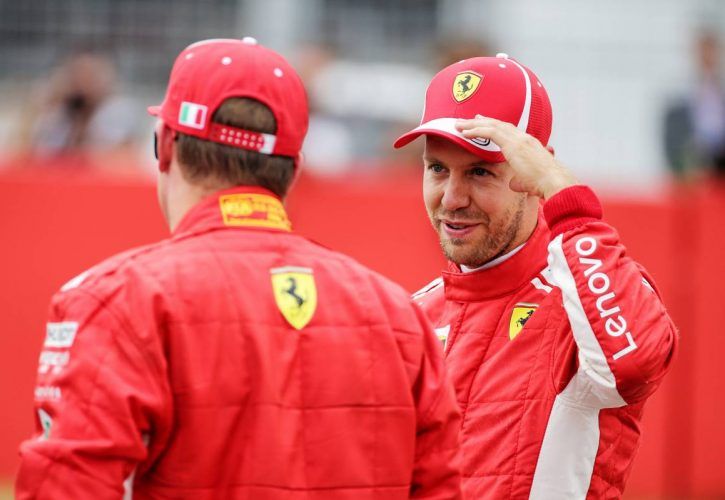 Kimi Raikkonen (FIN) Ferrari with German Grand Prix pole sitter and team mate Sebastian Vettel
