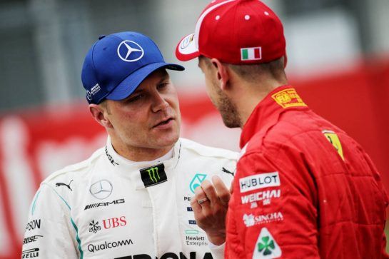 (L to R): second placed Valtteri Bottas (FIN) Mercedes AMG F1 with pole sitter Sebastian Vettel (GER) Ferrari in qualifying parc ferme.
21.07.2018. Formula 1 World Championship, Rd 11, German Grand Prix, Hockenheim, Germany, Qualifying Day.
- www.xpbimages.com, EMail: requests@xpbimages.com - copy of publication required for printed pictures. Every used picture is fee-liable. © Copyright: Bearne / XPB Images