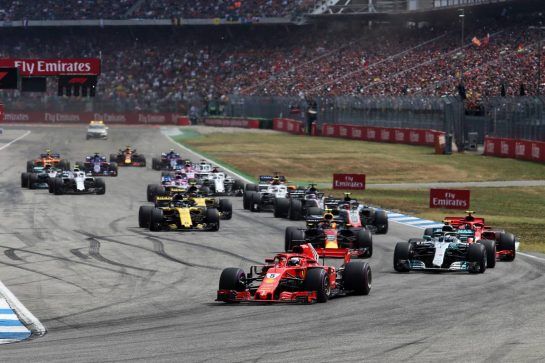 Sebastian Vettel (GER) Ferrari SF71H leads at the start of the race.
22.07.2018. Formula 1 World Championship, Rd 11, German Grand Prix, Hockenheim, Germany, Race Day.
- www.xpbimages.com, EMail: requests@xpbimages.com - copy of publication required for printed pictures. Every used picture is fee-liable. © Copyright: Charniaux / XPB Images