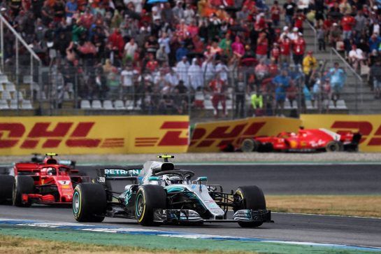 Sebastian Vettel (GER) Ferrari SF71H crashed out of the race and is passed by Valtteri Bottas (FIN) Mercedes AMG F1 W09 and Kimi Raikkonen (FIN) Ferrari SF71H.
22.07.2018. Formula 1 World Championship, Rd 11, German Grand Prix, Hockenheim, Germany, Race Day.
- www.xpbimages.com, EMail: requests@xpbimages.com - copy of publication required for printed pictures. Every used picture is fee-liable. © Copyright: Photo4 / XPB Images