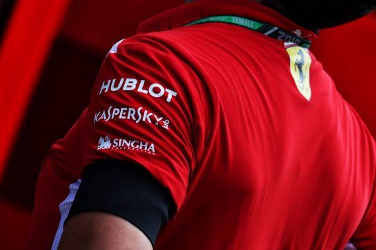 Ferrari employee wearing a black armband in tribute to the passing of Sergio Marchionne.
26.07.2018. Formula 1 World Championship, Rd 12, Hungarian Grand Prix, Budapest, Hungary, Preparation Day.
- www.xpbimages.com, EMail: requests@xpbimages.com - copy of publication required for printed pictures. Every used picture is fee-liable. © Copyright: Photo4 / XPB Images