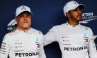 Hungarian Grand Prix: Second placed Valtteri Bottas (FIN) Mercedes AMG F1 in qualifying parc ferme with team mate and pole sitter Lewis Hamilton