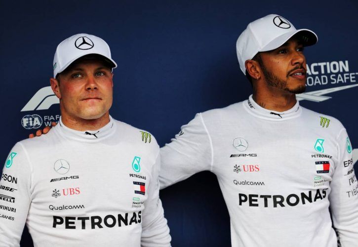 Hungarian Grand Prix: Second placed Valtteri Bottas (FIN) Mercedes AMG F1 in qualifying parc ferme with team mate and pole sitter Lewis Hamilton