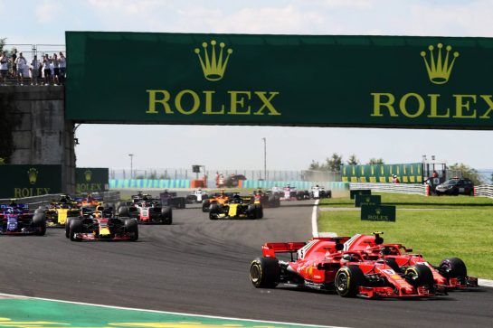 Sebastian Vettel (GER) Ferrari SF71H and Kimi Raikkonen (FIN) Ferrari SF71H at the start of the race.
29.07.2018. Formula 1 World Championship, Rd 12, Hungarian Grand Prix, Budapest, Hungary, Race Day.
- www.xpbimages.com, EMail: requests@xpbimages.com - copy of publication required for printed pictures. Every used picture is fee-liable. © Copyright: Photo4 / XPB Images