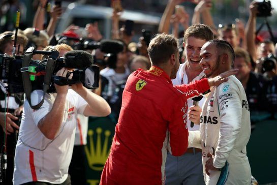 Lewis Hamilton (GBR) Mercedes AMG F1  and Sebastian Vettel (GER) Scuderia Ferrari with Paul Di Resta
29.07.2018. Formula 1 World Championship, Rd 12, Hungarian Grand Prix, Budapest, Hungary, Race Day.
- www.xpbimages.com, EMail: requests@xpbimages.com - copy of publication required for printed pictures. Every used picture is fee-liable. © Copyright: Charniaux / XPB Images