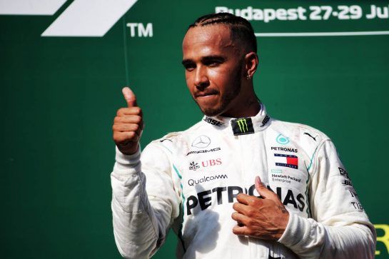 Race winner Lewis Hamilton (GBR) Mercedes AMG F1 celebrates on the podium.
29.07.2018. Formula 1 World Championship, Rd 12, Hungarian Grand Prix, Budapest, Hungary, Race Day.
- www.xpbimages.com, EMail: requests@xpbimages.com - copy of publication required for printed pictures. Every used picture is fee-liable. © Copyright: Bearne / XPB Images