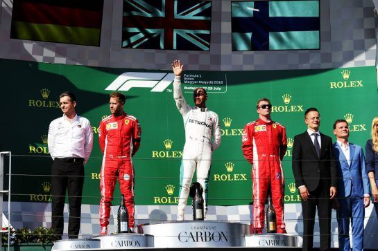 The podium (L to R): Sebastian Vettel (GER) Ferrari, second; Lewis Hamilton (GBR) Mercedes AMG F1, race winner; Kimi Raikkonen (FIN) Ferrari, third.
29.07.2018. Formula 1 World Championship, Rd 12, Hungarian Grand Prix, Budapest, Hungary, Race Day.
- www.xpbimages.com, EMail: requests@xpbimages.com - copy of publication required for printed pictures. Every used picture is fee-liable. © Copyright: Bearne / XPB Images
