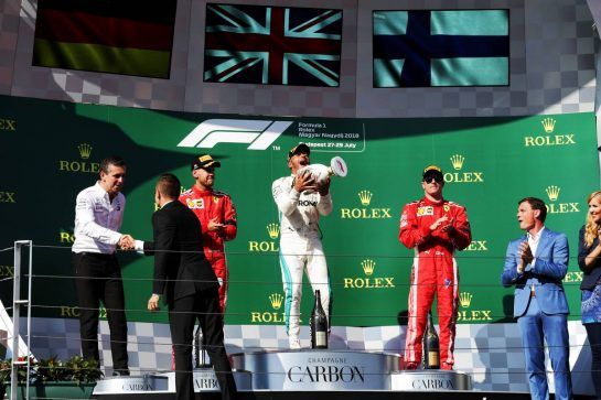 The podium (L to R): Sebastian Vettel (GER) Ferrari, second; Lewis Hamilton (GBR) Mercedes AMG F1, race winner; Kimi Raikkonen (FIN) Ferrari, third.
29.07.2018. Formula 1 World Championship, Rd 12, Hungarian Grand Prix, Budapest, Hungary, Race Day.
- www.xpbimages.com, EMail: requests@xpbimages.com - copy of publication required for printed pictures. Every used picture is fee-liable. © Copyright: Bearne / XPB Images