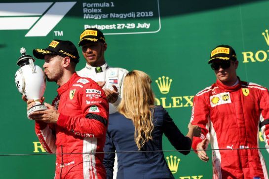 Sebastian Vettel (GER) Ferrari celebrates his second position on the podium.
29.07.2018. Formula 1 World Championship, Rd 12, Hungarian Grand Prix, Budapest, Hungary, Race Day.
- www.xpbimages.com, EMail: requests@xpbimages.com - copy of publication required for printed pictures. Every used picture is fee-liable. © Copyright: Bearne / XPB Images