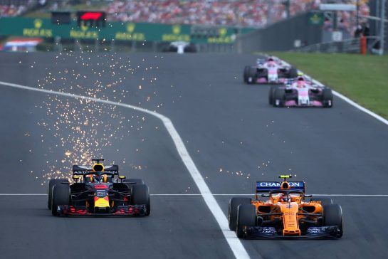 Stoffel Vandoorne (BEL) McLaren F1 and Daniel Ricciardo (AUS) Red Bull Racing 
29.07.2018. Formula 1 World Championship, Rd 12, Hungarian Grand Prix, Budapest, Hungary, Race Day.
- www.xpbimages.com, EMail: requests@xpbimages.com - copy of publication required for printed pictures. Every used picture is fee-liable. © Copyright: Charniaux / XPB Images
