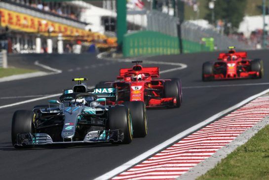 Valtteri Bottas (FIN) Mercedes AMG F1 and Sebastian Vettel (GER) Scuderia Ferrari 
29.07.2018. Formula 1 World Championship, Rd 12, Hungarian Grand Prix, Budapest, Hungary, Race Day.
- www.xpbimages.com, EMail: requests@xpbimages.com - copy of publication required for printed pictures. Every used picture is fee-liable. © Copyright: Charniaux / XPB Images