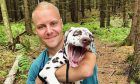 Mercedes driver Valtteri Bottas and his new dog Fanni.