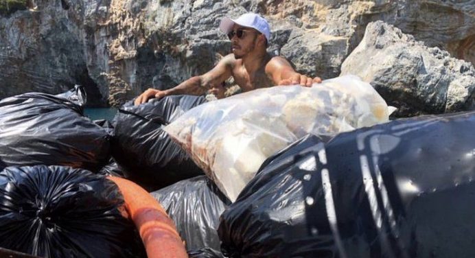 Hamilton gets his hands dirty, slams plastic waste