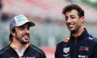 Fernando Alonso (ESP) McLaren and Daniel Ricciardo (AUS) Red Bull Racing.
